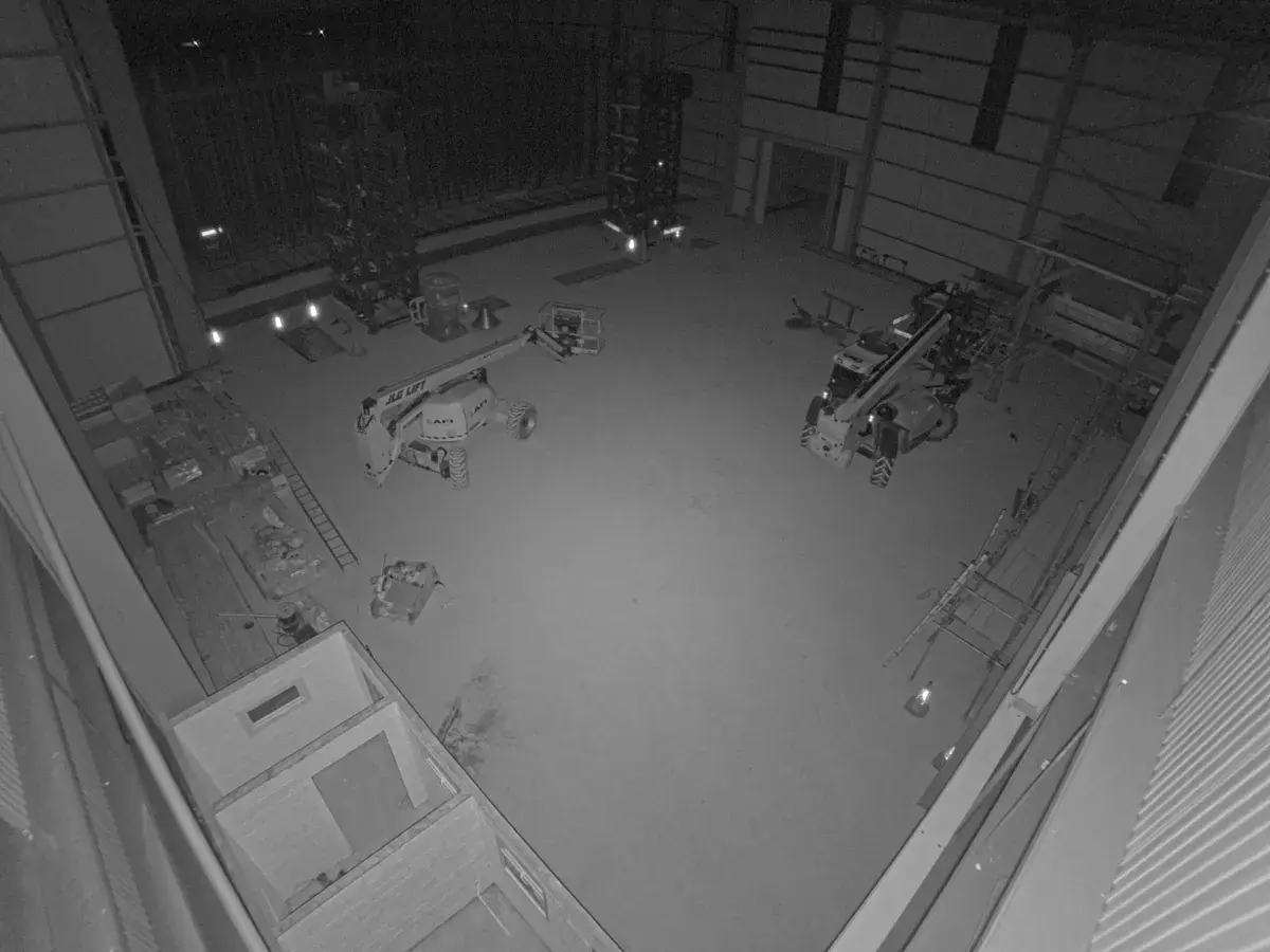Low-light camera view across the WDL production floor